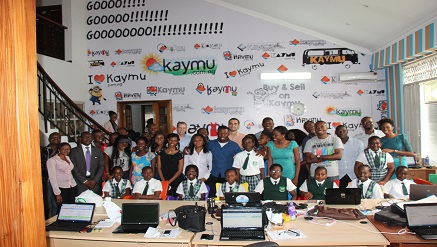 Kaymu management and staff with pupils of Kiddie Quest Montessori School at the training helf at Kaymu office on Tuesday